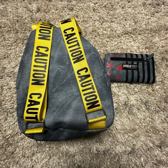 Hot Topic- like new Bird of the pray backpack and wallet set -collectable